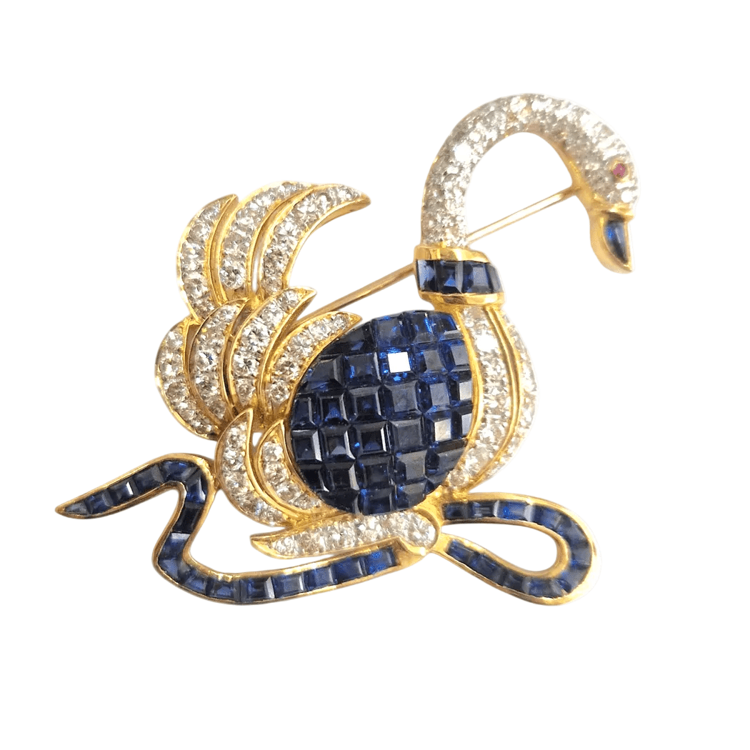 Broche Épingle en or jaune, saphirs et diamants - Castafiore