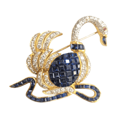 Broche Épingle en or jaune, saphirs et diamants - Castafiore