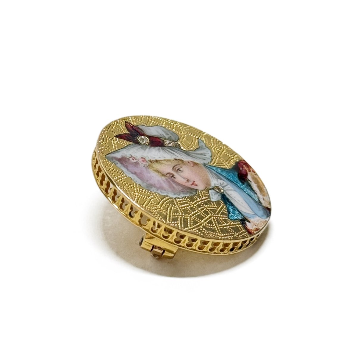 Broche "femme au chapeau" en or jaune - Castafiore