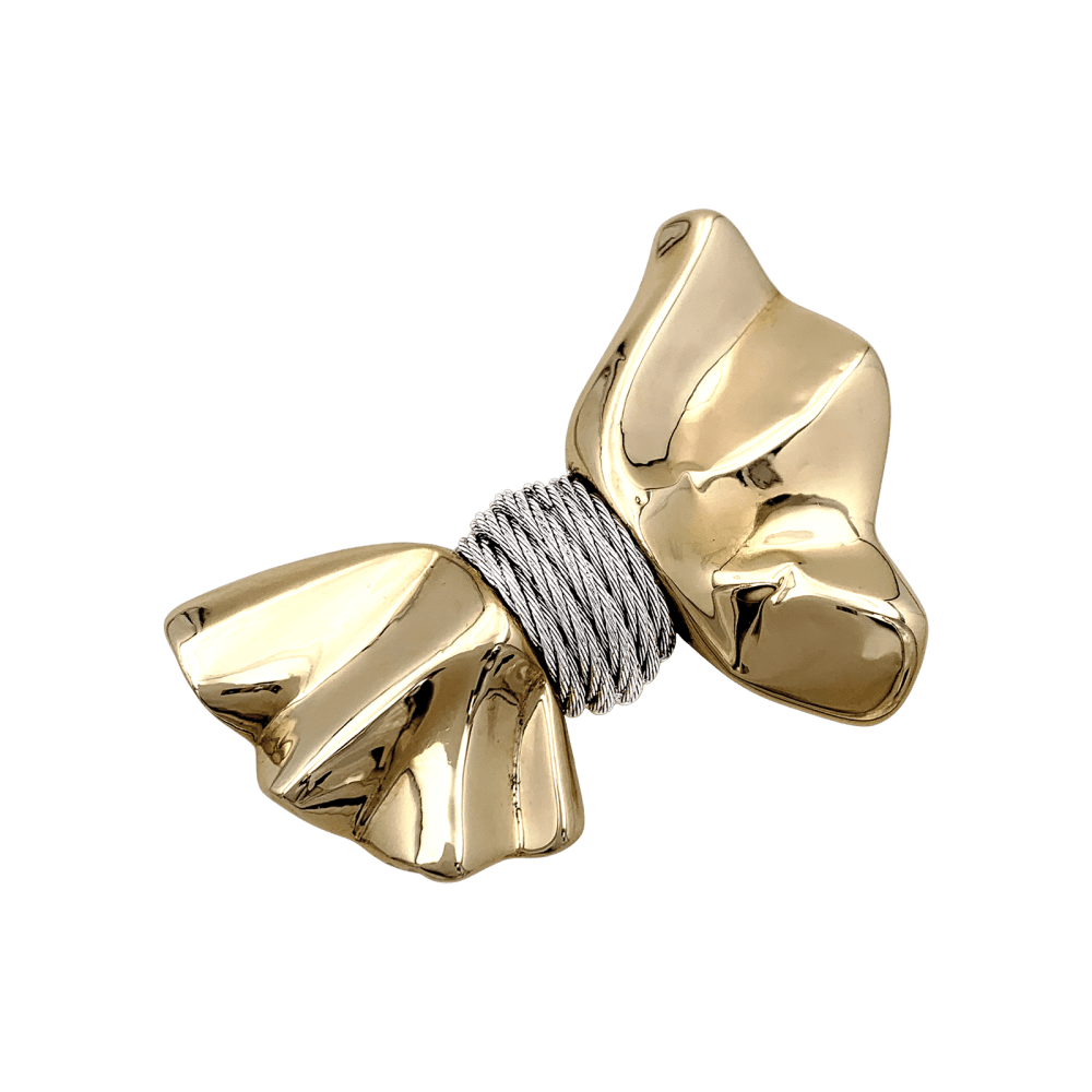 Brooch Fred, "Nœud", yellow gold and steel.