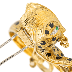 Broche FRED "Panthère" en or jaune, émail, émeraudes et diamants - Castafiore