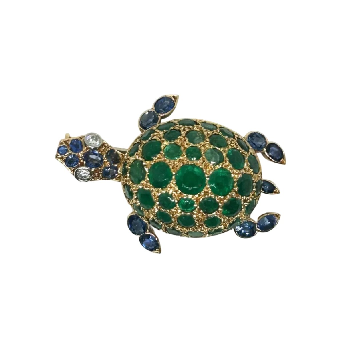 Broche GUBELIN en or jaune, émeraudes, saphirs et diamants - Castafiore