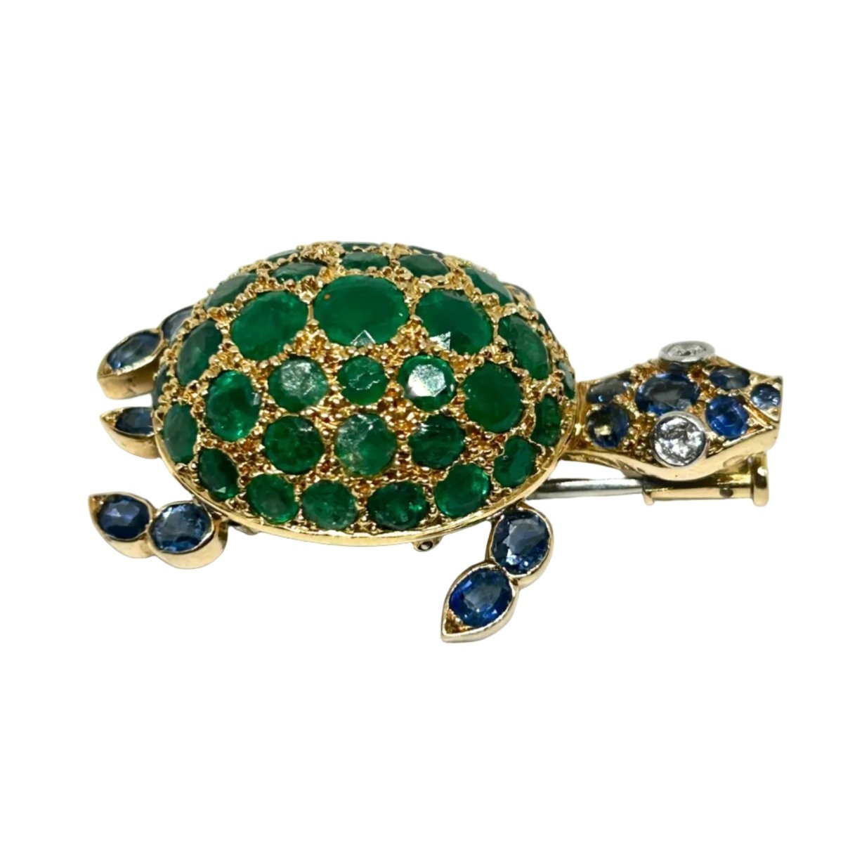 Broche GUBELIN en or jaune, émeraudes, saphirs et diamants - Castafiore