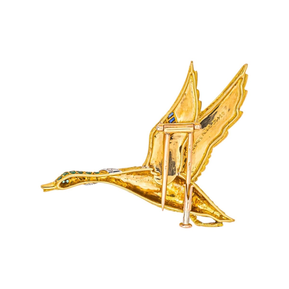 Broche HERMÈS "Oie Sauvage" en or jaune, or blanc, tsavorites, saphirs et diamants - Castafiore