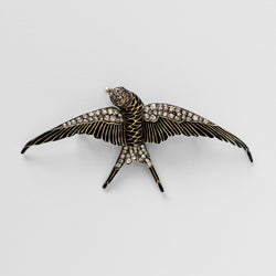Broche "hirondelle" en or jaune et argent - Castafiore
