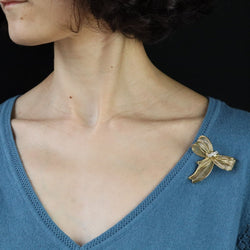 Brooch gold bow and diamonds