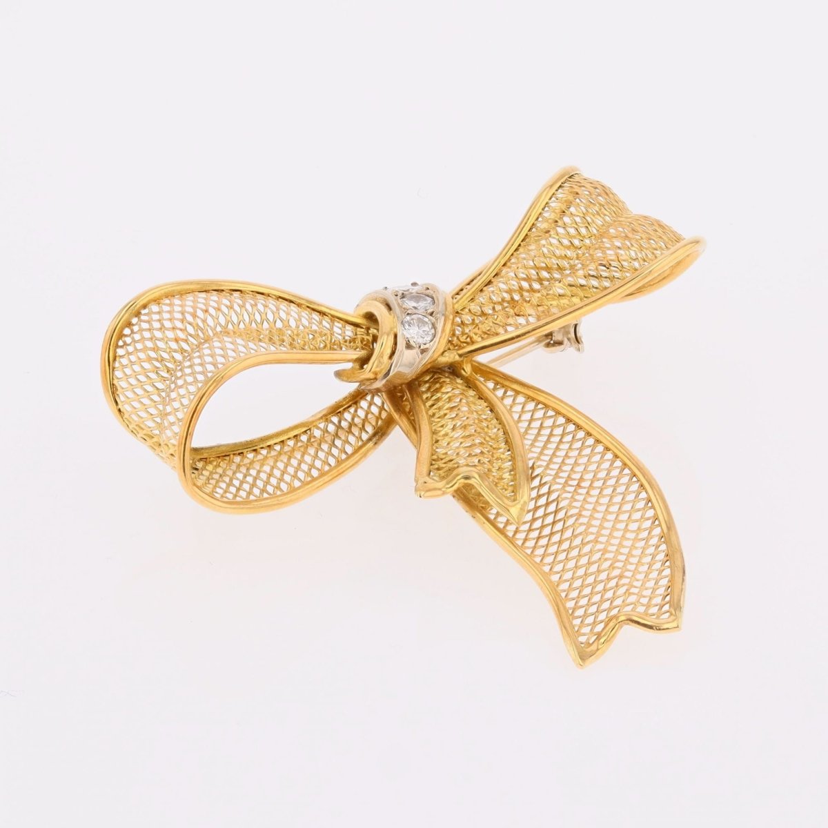 Brooch gold bow and diamonds