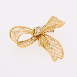 Brooch gold bow and diamonds