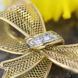 Brooch gold bow and diamonds