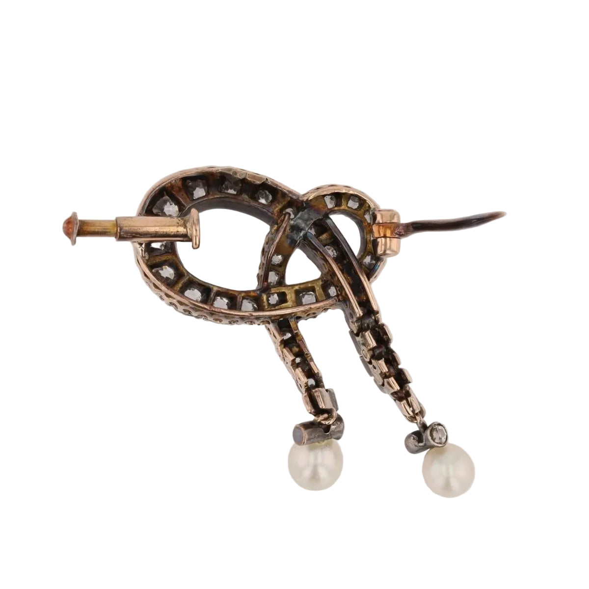 Broche noeud en or rose et argent avec perles fines et diamants - Castafiore