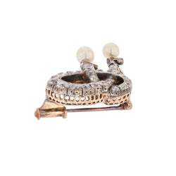 Broche noeud en or rose et argent avec perles fines et diamants - Castafiore