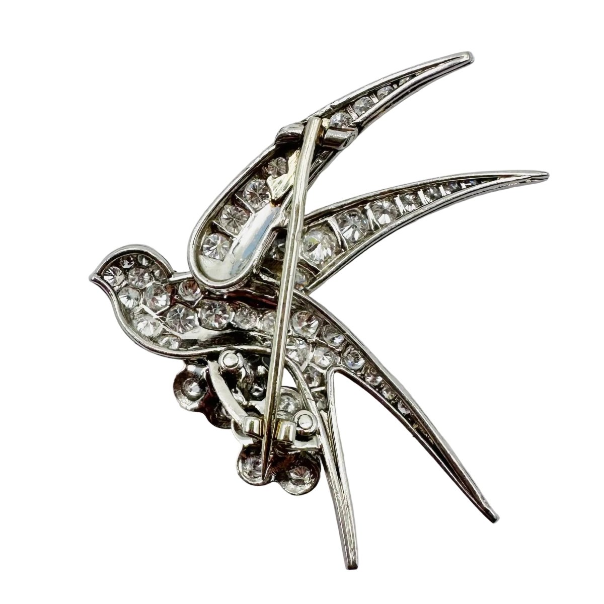 Broche "Oiseau posé sur deux fleurs" en or blanc, platine et rubis - Castafiore