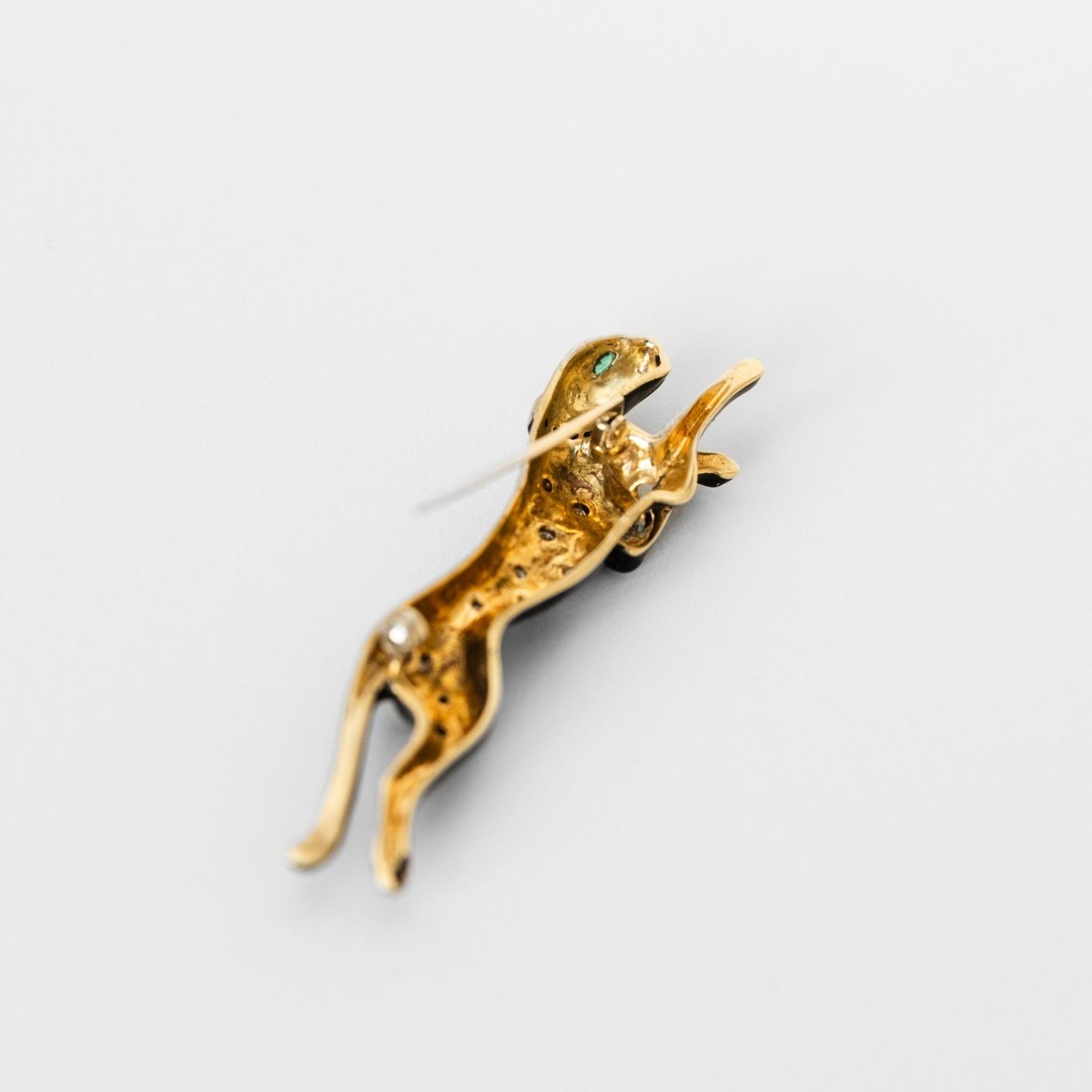 Broche panthère André VASSORT en or jaune et émail noir - Castafiore