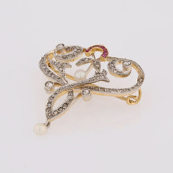Broche pendentif Art Nouveau en or jaune et platine avec diamants, perles fines et rubis - Castafiore