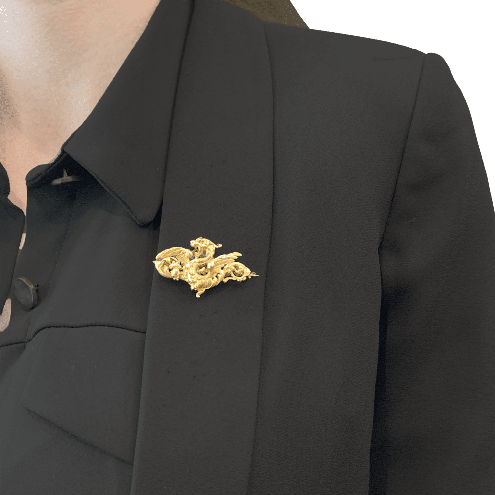 Brooch Chimera in yellow gold.