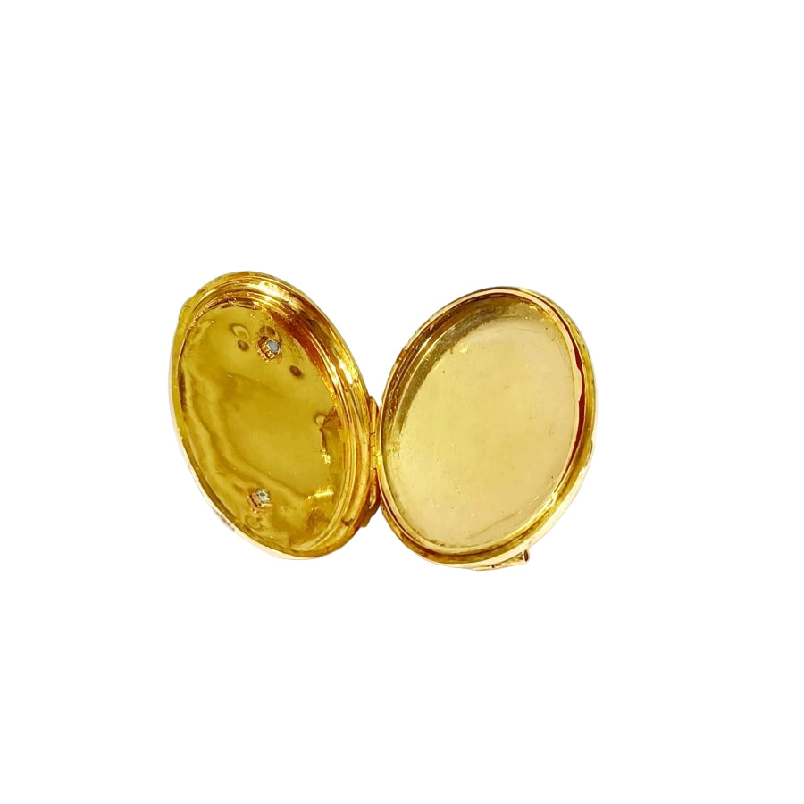 Broche PORTE Photo en or rose et perles - Castafiore