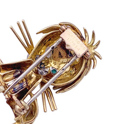 Broche Van Cleef & Arpels, "Lion ébouriffé", en or jaune, diamants, émeraudes et émail. - Castafiore