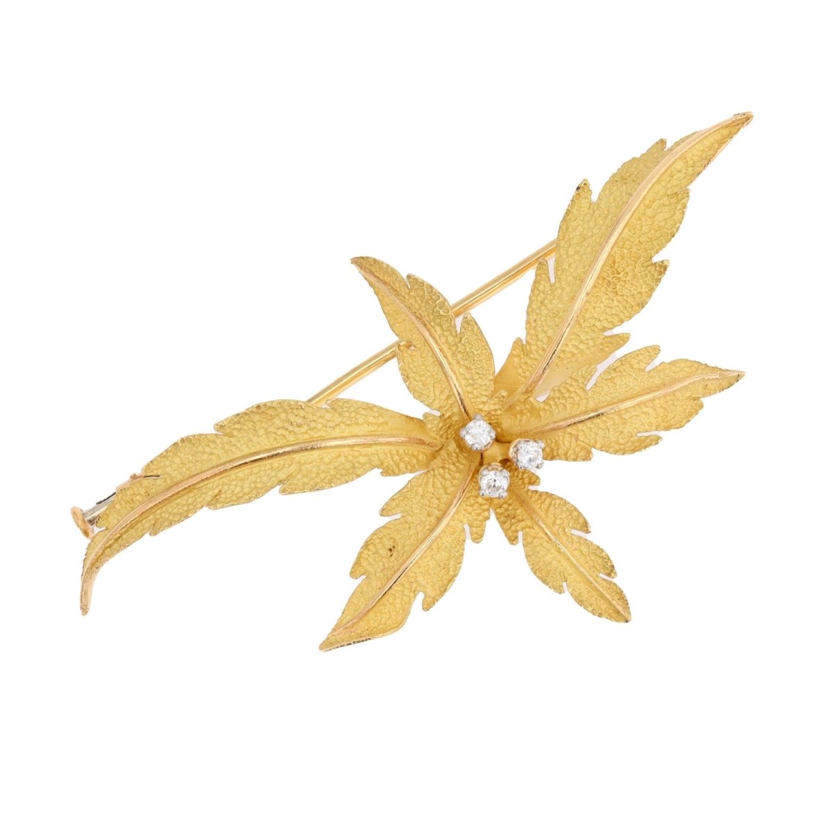 Brooch in amati gold and diamonds