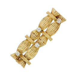 Broche VINTAGE Fagots en or jaune et diamants - Castafiore