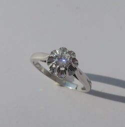 Bague Solitaire en or blanc, platine, et diamant