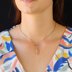 Rose gold and pearl pendant