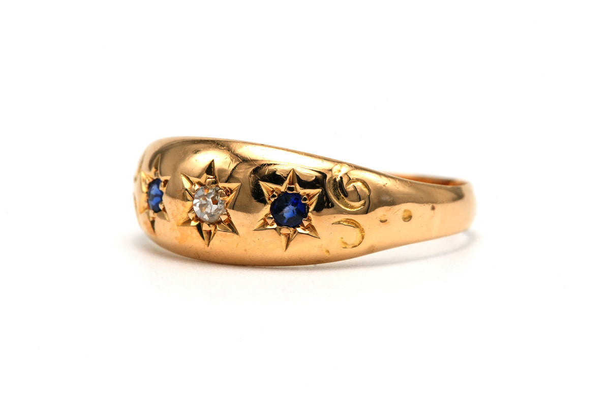 Bague en or jaune, saphirs et diamants