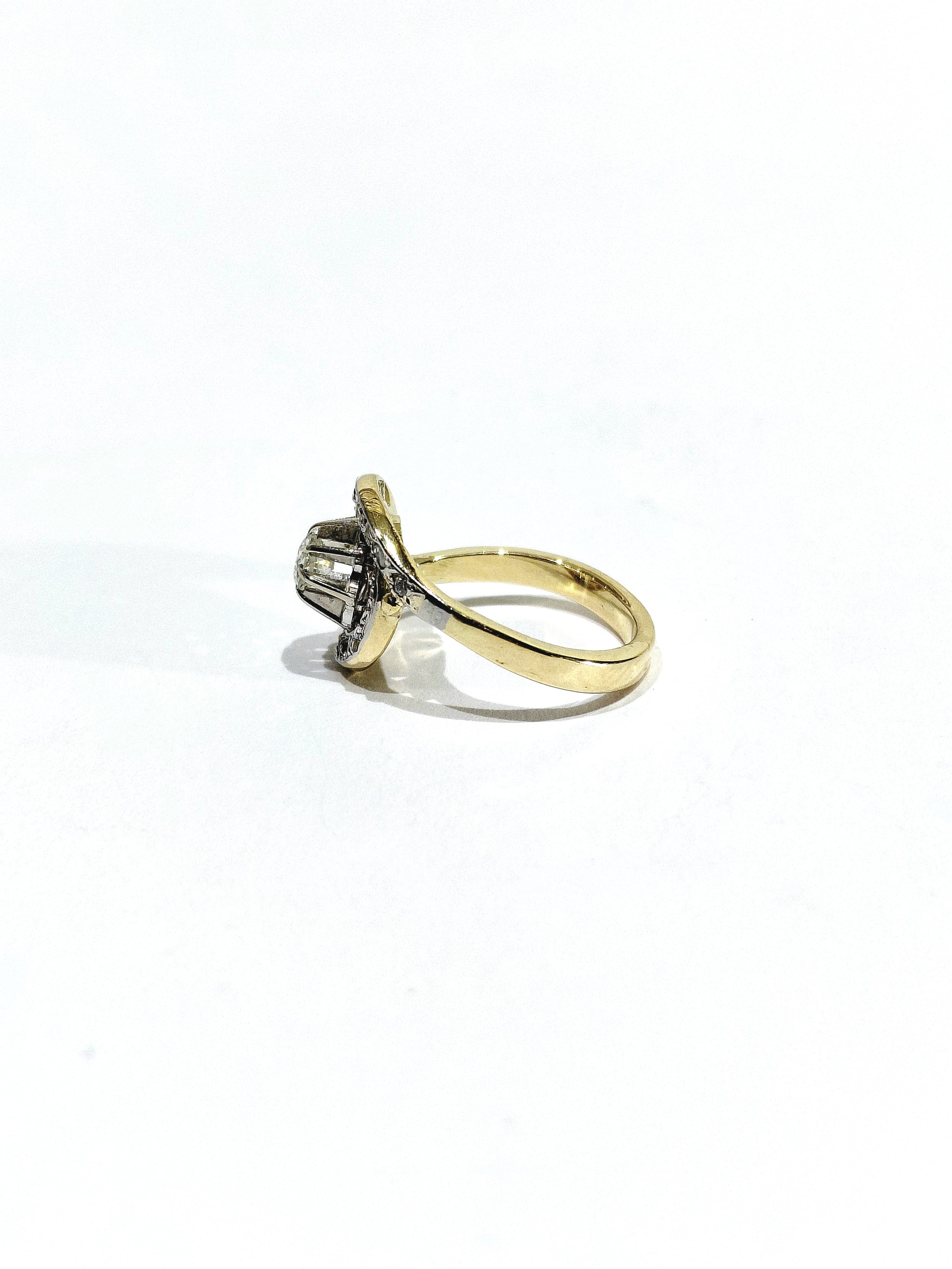 Tourbillon ring in yellow gold, white gold, and diamonds