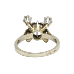 Entourage Ring in white gold, Platinum, and Diamonds