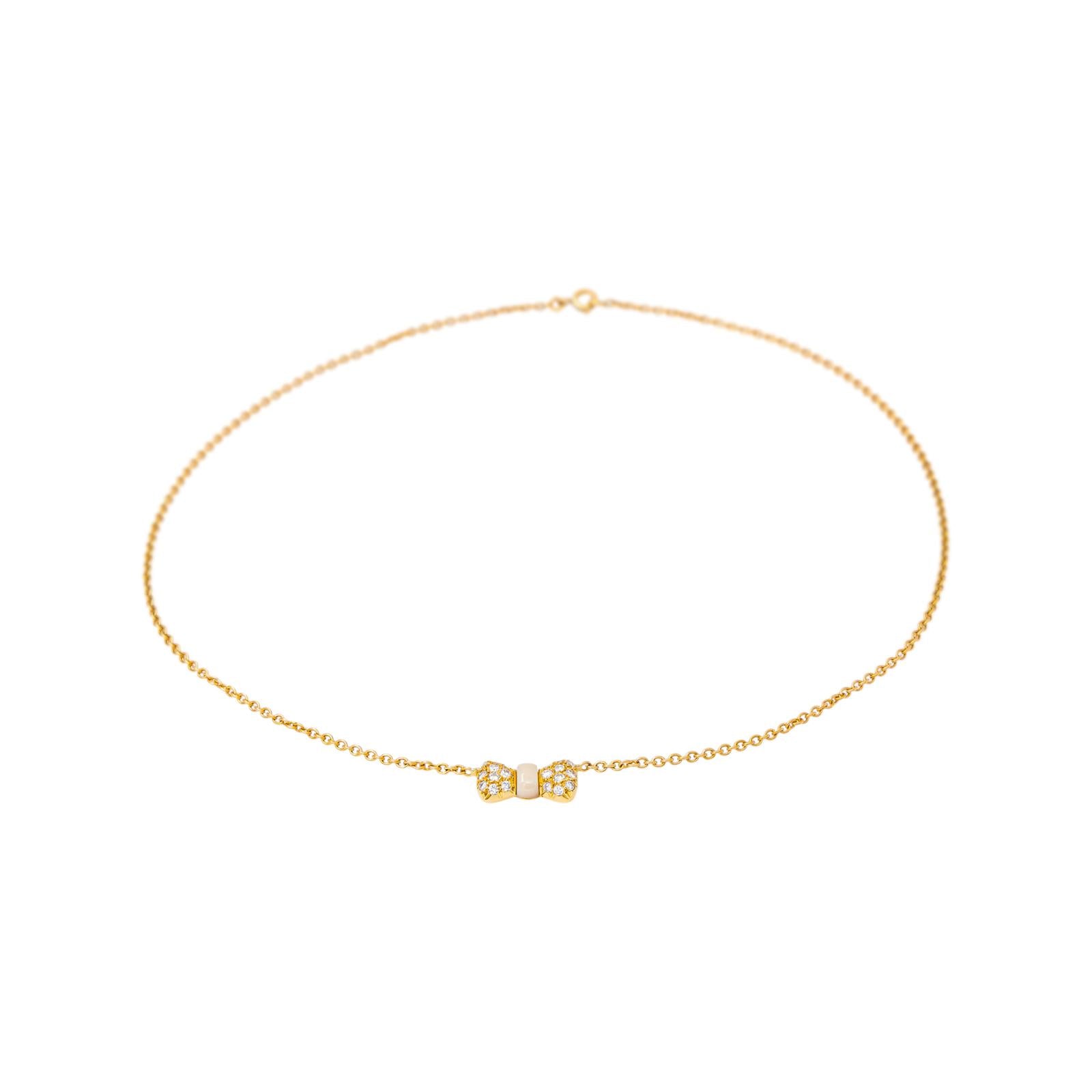 Van Cleef & Arpels "Nœud" Necklace in Yellow gold with White Coral