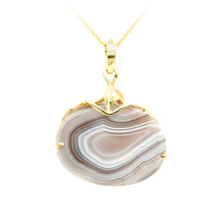 Pendentif en or jaune, agate et diamant