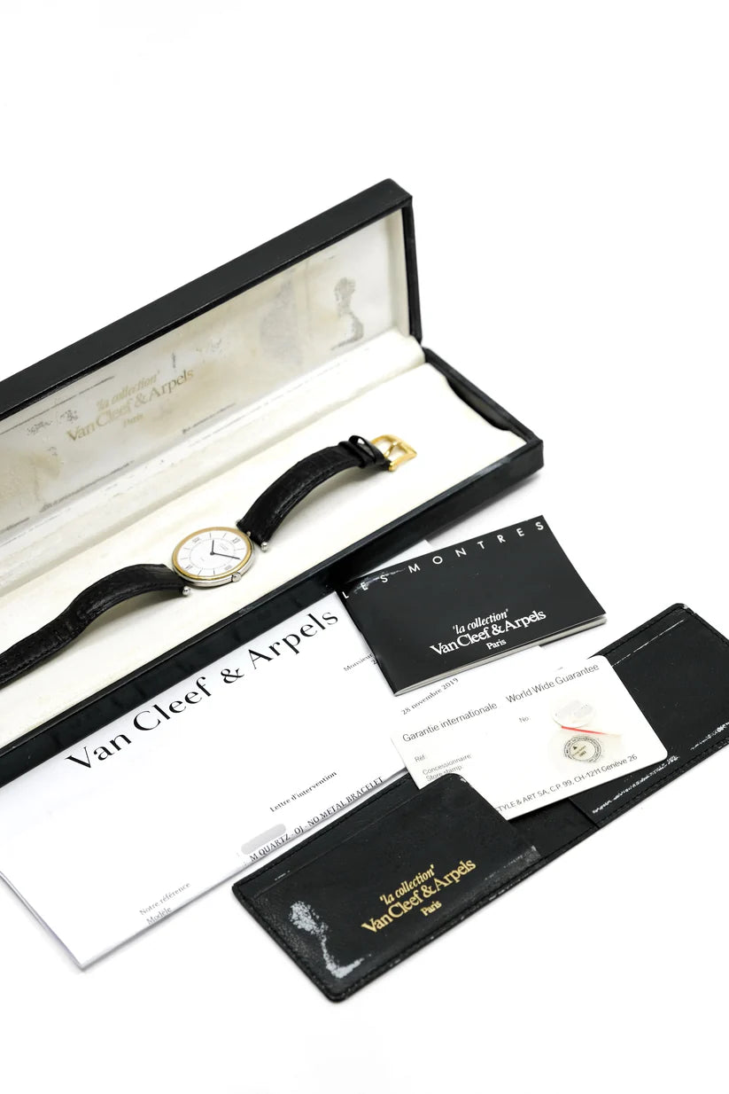 VAN CLEEF & ARPELS "PA 49" Watch in Yellow gold, steel and leather