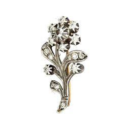Brooch made of yellow gold, silver, sapphires, and diamonds
