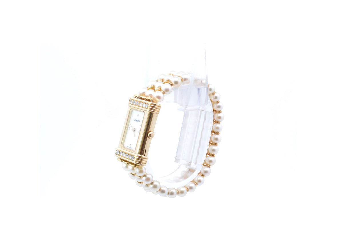 OJ Perrin watch in yellow gold, pearls, and diamonds