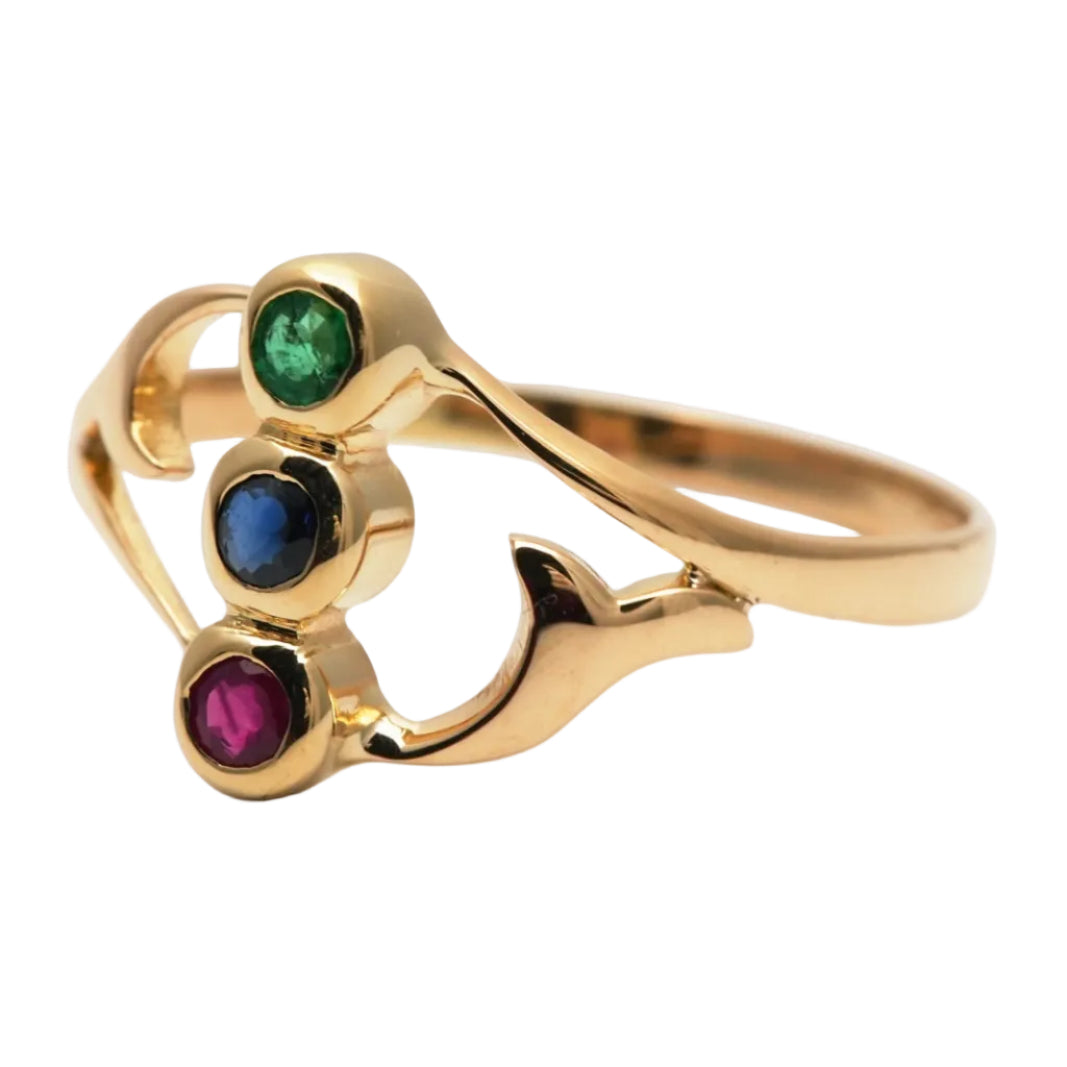 Trilogy Ring in yellow gold, emerald, sapphire, and ruby