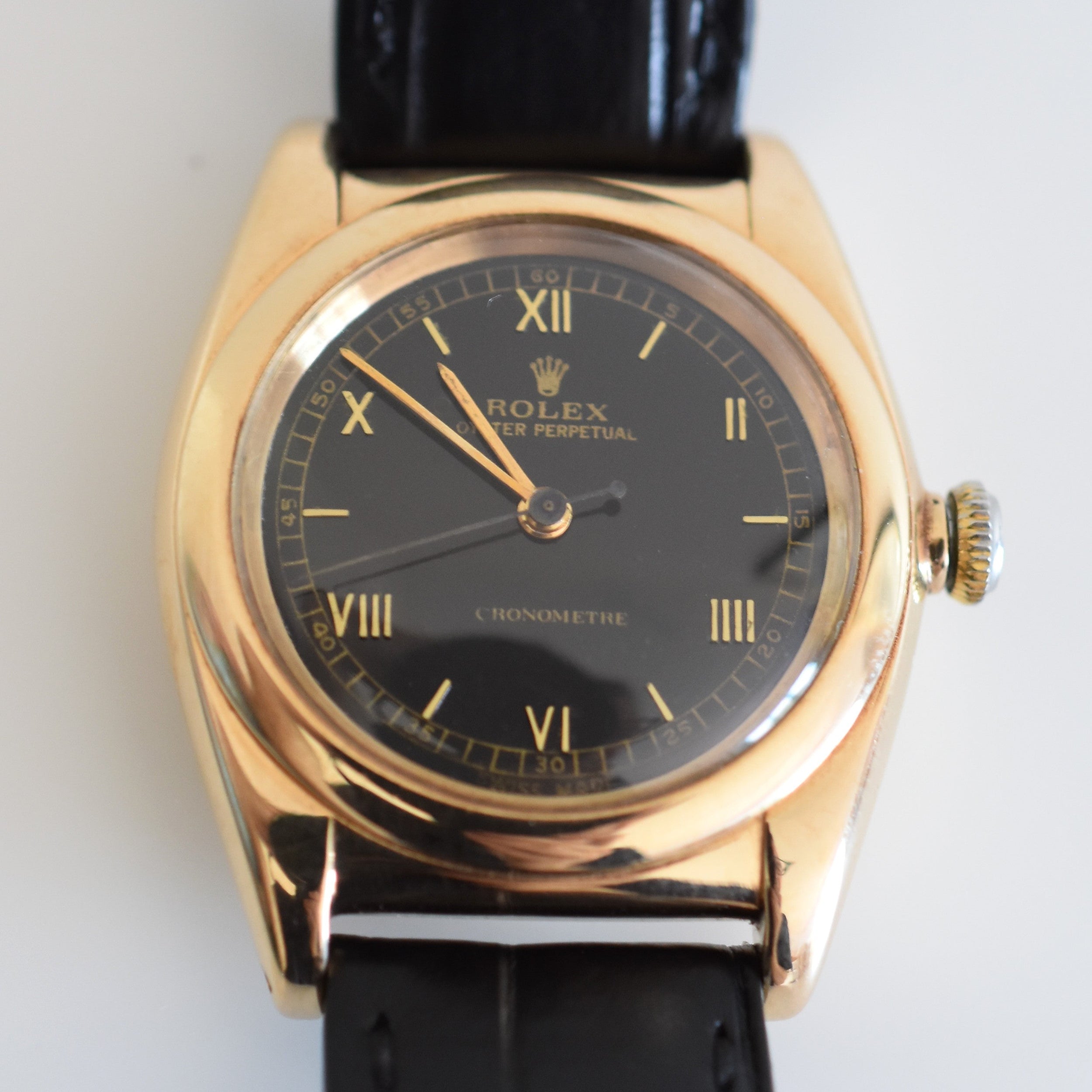 ROLEX "Oyster Perpetual Bubbleback Ovetto" watch in yellow gold and leather