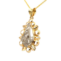 Pendant made of white gold, yellow gold, and diamonds