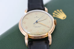 ROLEX "Chronometer" watch in rose gold, steel, and leather