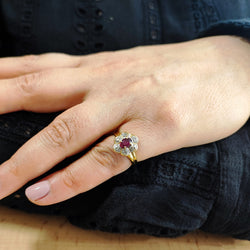Entourage Ring in yellow gold, rubies, and diamonds