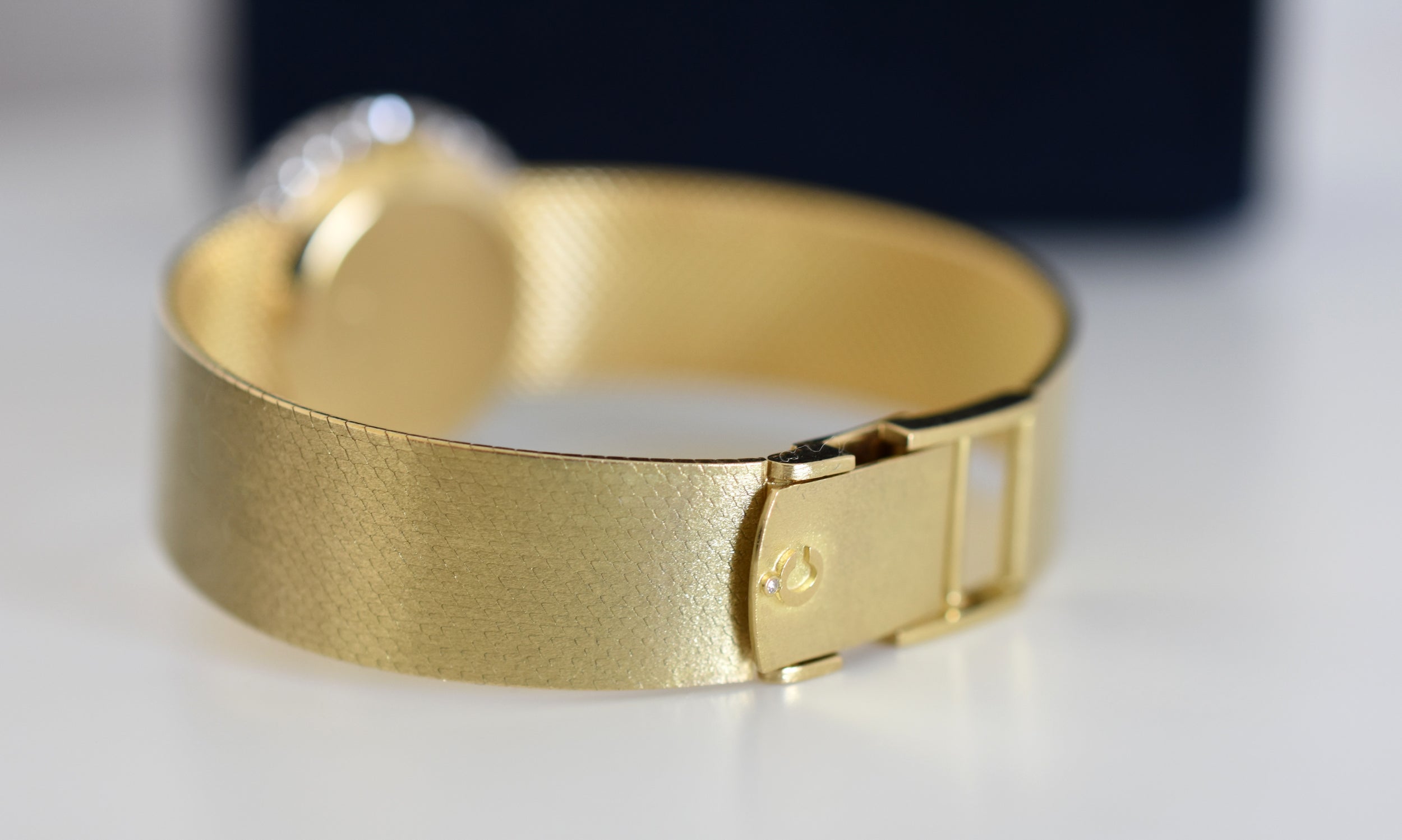 CHOPARD watch, Ref. 810, 18-carat yellow gold and diamonds, solid gold integrated bracelet, circa 1980.