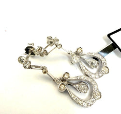 Boucles d'oreilles Pendantes en or blanc et diamants