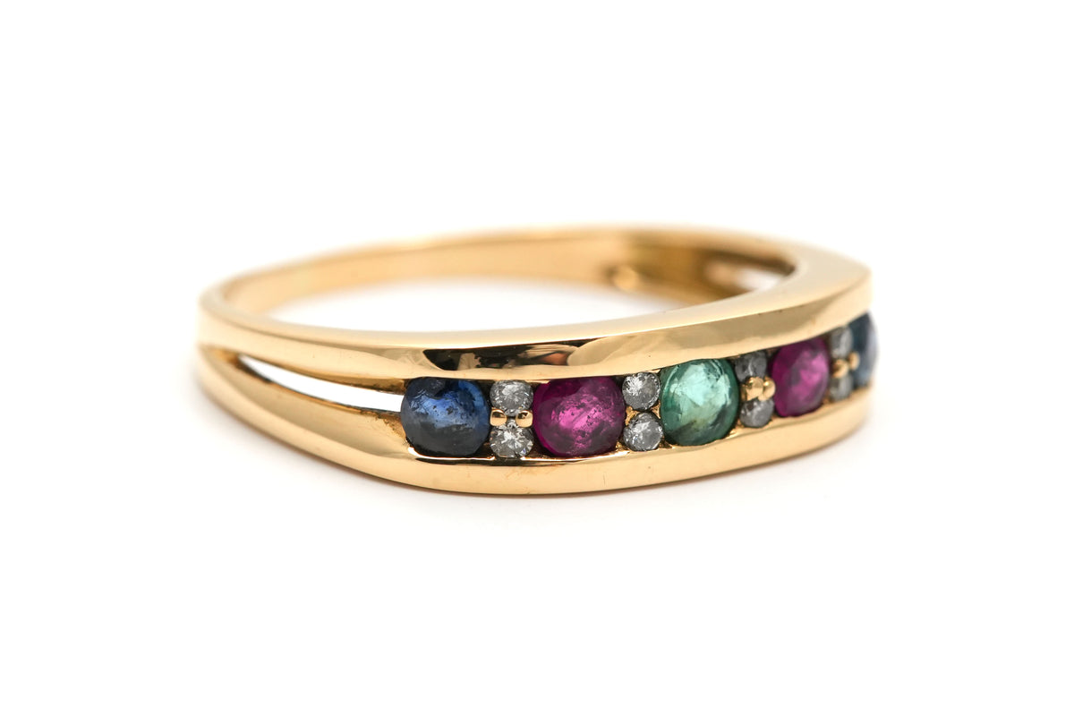 Yellow gold ring with an emerald, Ruby, Sapphires, and Diamonds