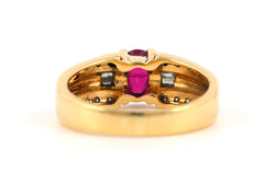 Bague en or jaune, rubis et diamants