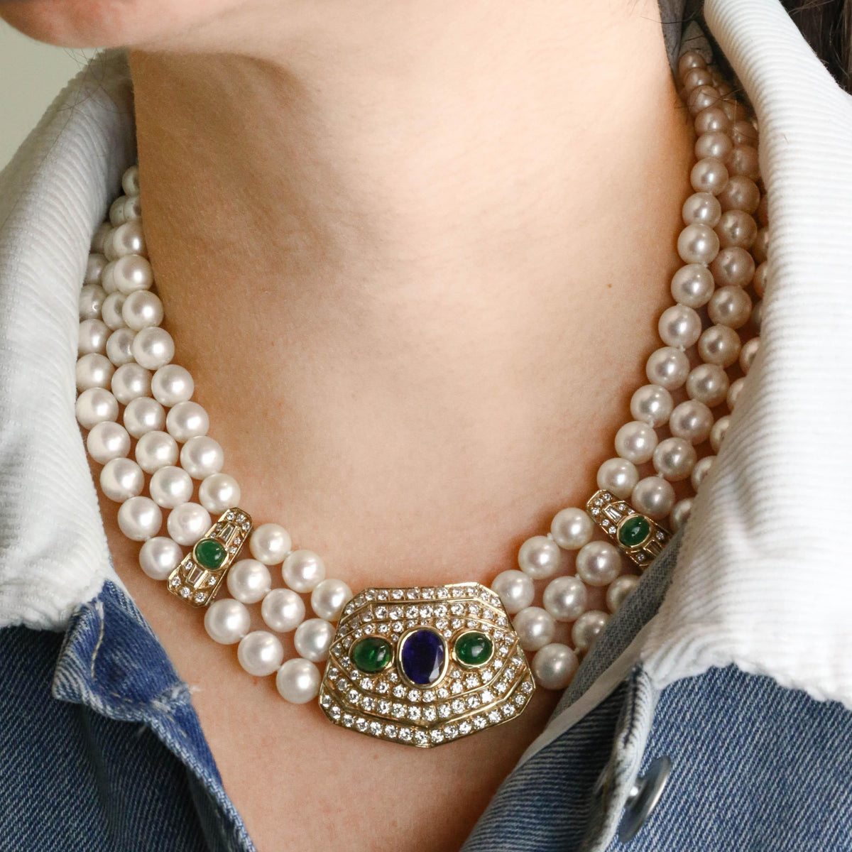 REPOSSI set in yellow gold, with pearls, sapphires, emeralds, and diamonds