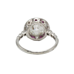 Entourage Ring in platinum, rubies, and diamonds