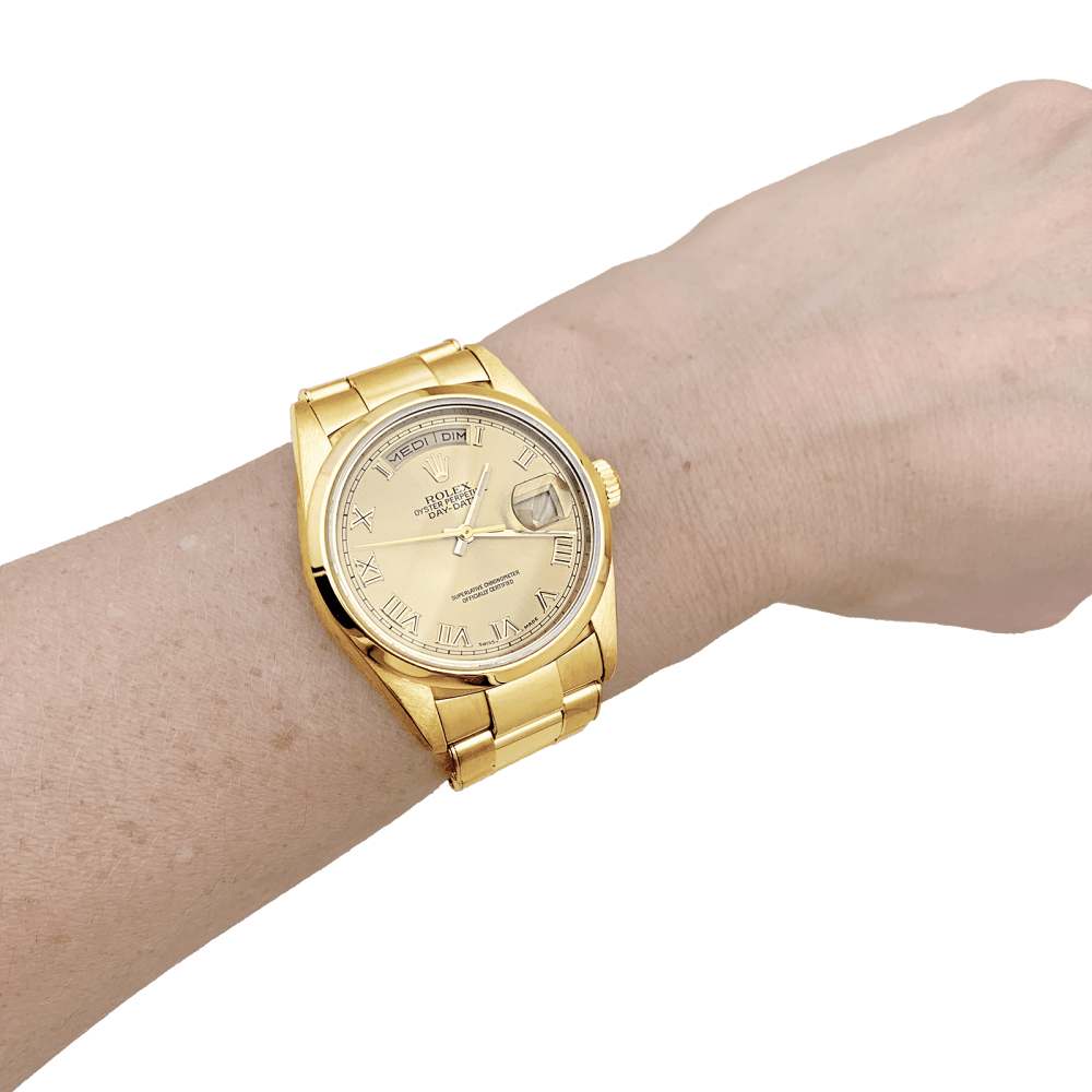 Montre Rolex, "Oyster Perpetual Day-date", or jaune.