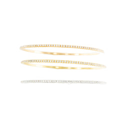 Three bangle bracelets in white gold, yellow gold, rose gold, and diamonds