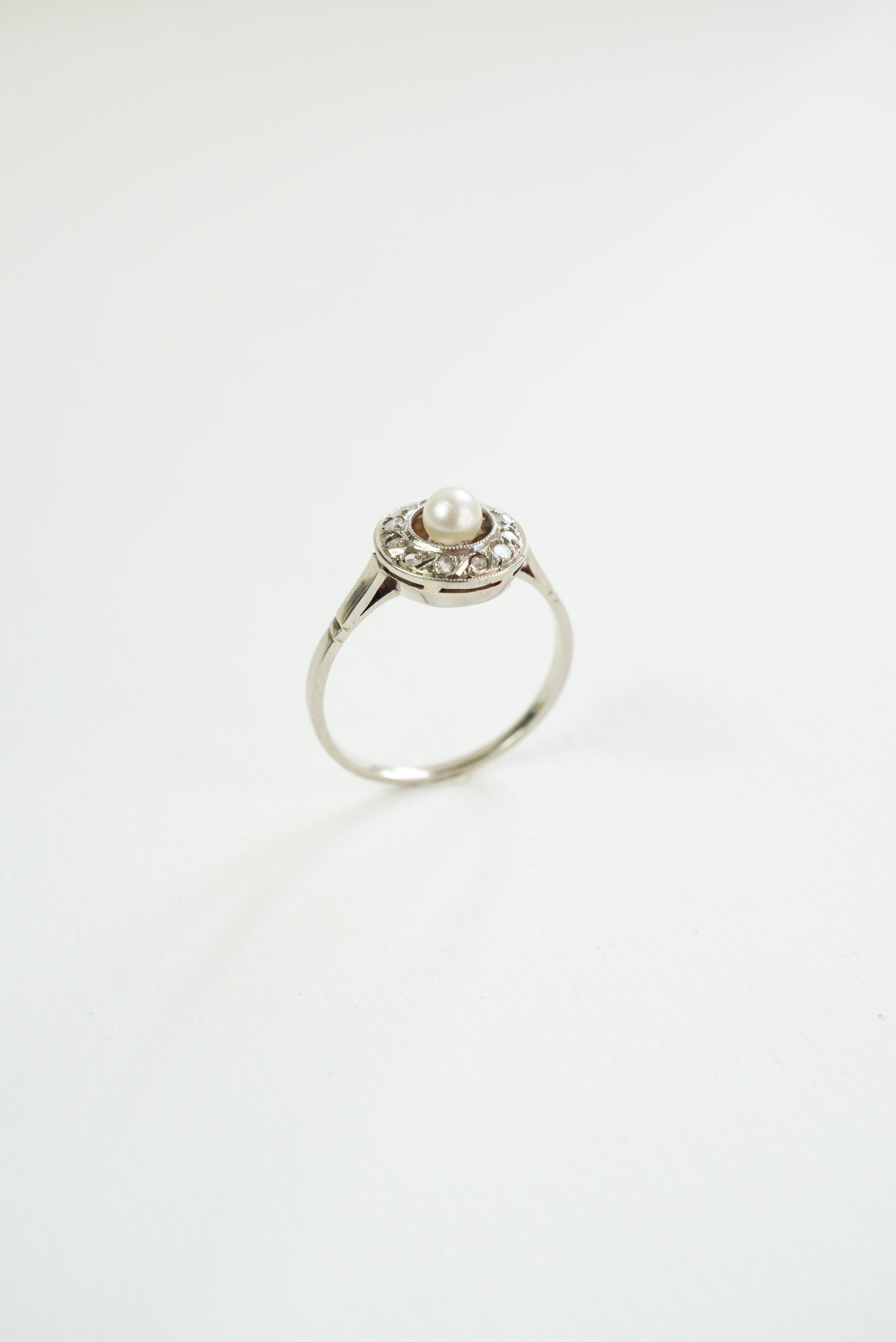 Gold Target Ring with Diamonds and a Pearl