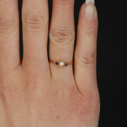 Trilogy Ring in yellow gold, pearl, and sapphires