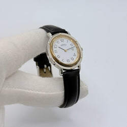 HERMÈS "Clipper" Watch in yellow gold, stainless steel, and leather