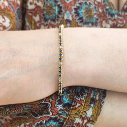 "Ligne" Bracelet in Yellow Gold, Sapphires, and Diamonds